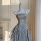Robe de soirée courte à bretelles spaghetti et sequins argentés nv4218
