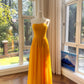 NiceVestidos - _V Hellgelbes, trägerloses, gerafftes Chiffon-Abendkleid NV5916
