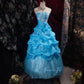 Robe de bal longue en tulle bleu délicatement perlée NV6661