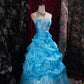 Robe de bal longue en tulle bleu délicatement perlée NV6661