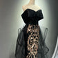 Robe de bal longue noire et dorée NV6623
