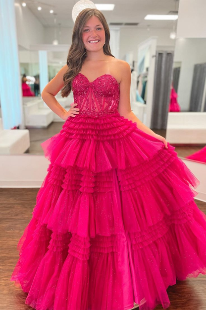 Robe de bal longue en tulle fuchsia à plusieurs couches et à appliques sans bretelles nv1290