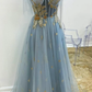 Robe de soirée longue à appliqués bleu et or de coupe A nv591