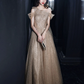 Robe de soirée longue en tulle champagne à une épaule nv430