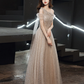 Robe de soirée longue en tulle champagne à une épaule nv430