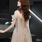 Robe de soirée longue en tulle champagne à une épaule nv430